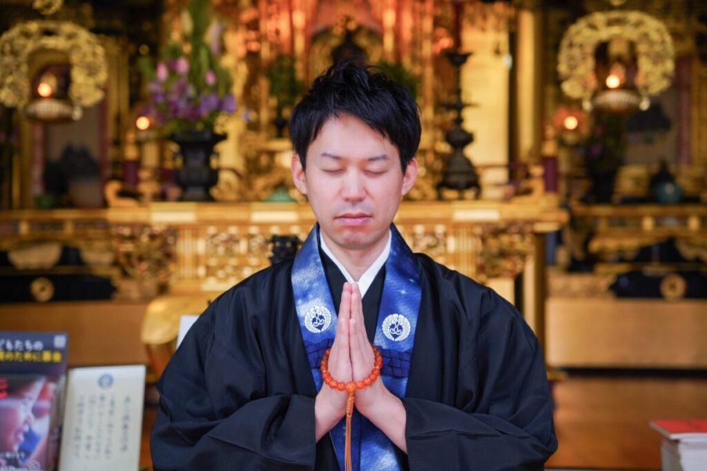 池田唯信師合掌写真